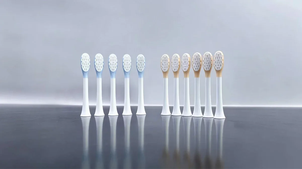 Multi-color molded toothbrush heads