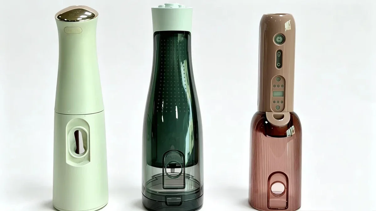 Three multi-color water flosser housings
